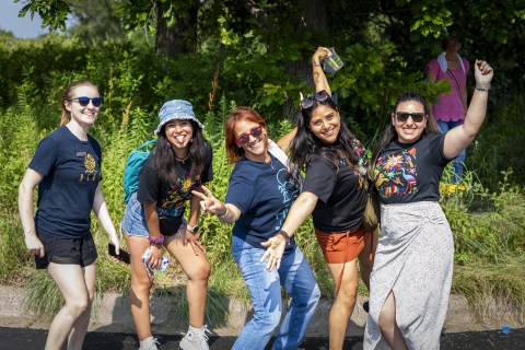 volunteers standing in front of trees