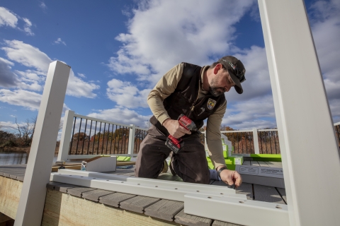 FWS worker constructing a deck
