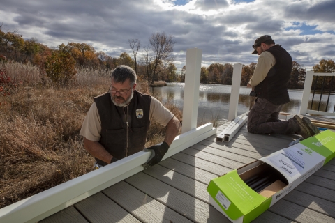 Wage grade workers building a deck