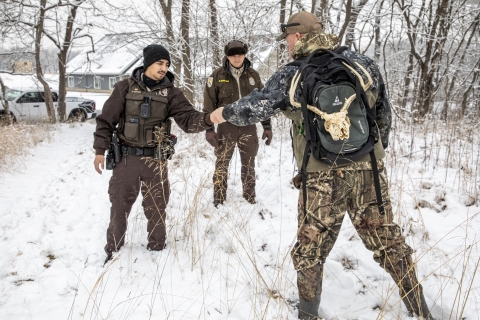 Refuge officers meeting on snow covered day