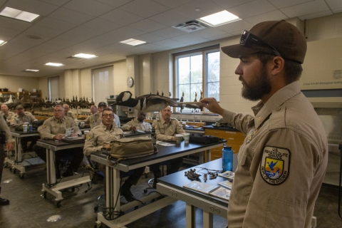 Refuge Law Enforcement officers learn to identify Hooded Merganser ducks