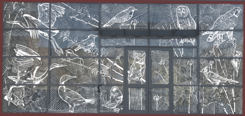A mockup of panels featuring bird designs for the glass entryway of a building
