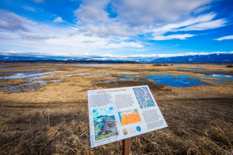 An interpretive panel discusses geology of the local region