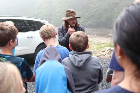 Man standing in front of a group of children