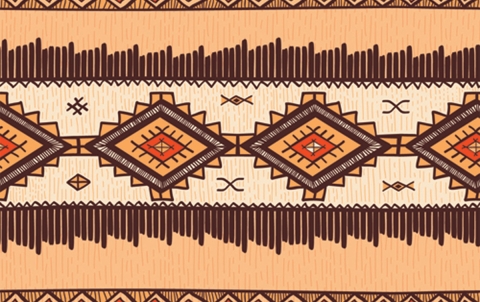 brown and yellow tribal design on a blanket