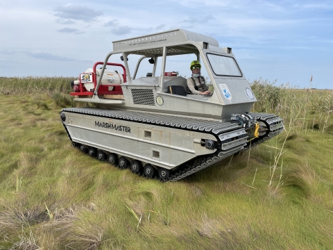 Coastal Program biologist operating a Marsh Master at the Little Creek Wildlife Area near Port Mahon Delaware