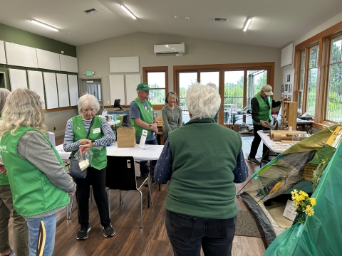 Ankeny Hill Nature Center volunteers preparing for Bees, Trees, and Blooms