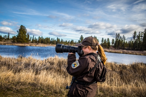 Ranger Laurel Smith taking a photo