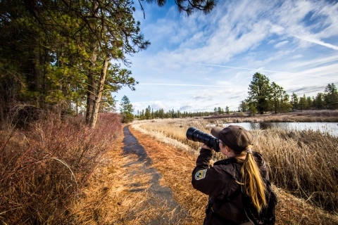 Ranger Laurel Smith taking a photo