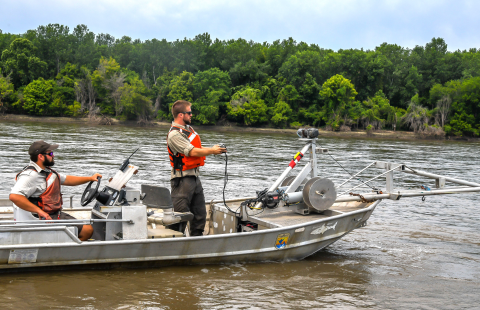 A closer sideview of the crew positioning during sampling.