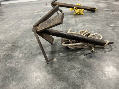 A heavier Grapnel-type anchor made for holding in sandy riverbeds