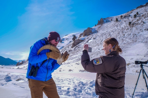 Person with skull and person with phone