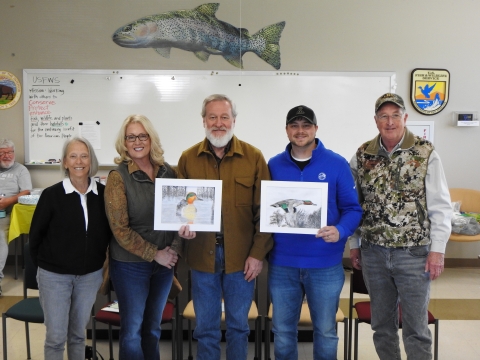 5 people posing with duck art
