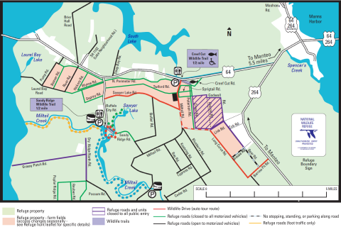 A complex map showing the refuge boundary, roads, and walking trails, colored in purple, green, and yellow to indicate access. For accessibility, please call 252-473-1131