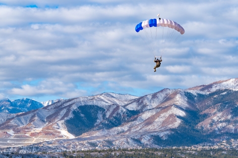parachuter over mountains