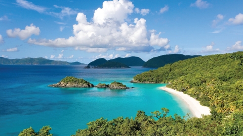 Shoreline of Virgin Island National Park with cays in the mid and background.