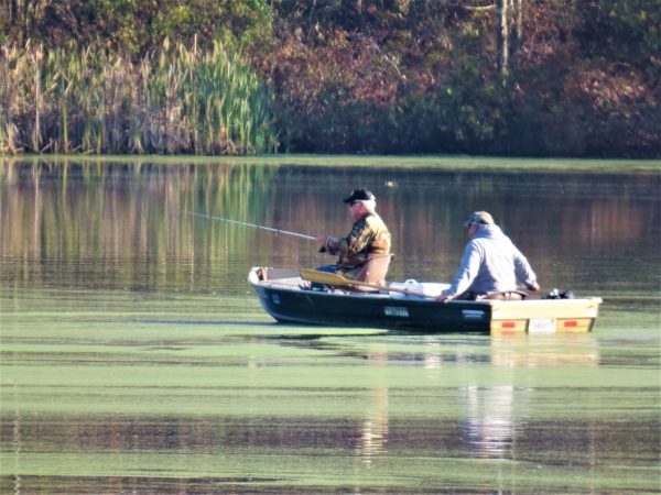 Two men fishing from a rowboat at Muscatatuck NWR