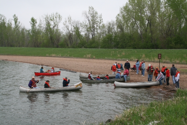Students loading into kayaks at the hand launch of DeSoto