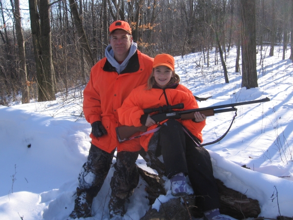 Father and daughter deer hunters