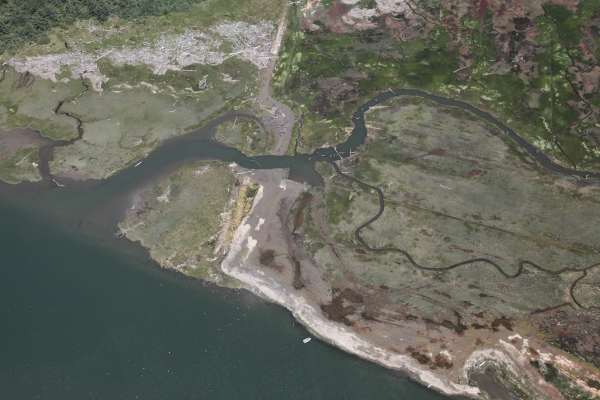 Aerial photo of the mouth of Fahy Creek post restoration at the Ni-les'tun Marsh.