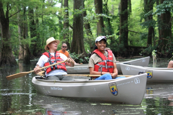 An image of a group of people on a canoe trip.