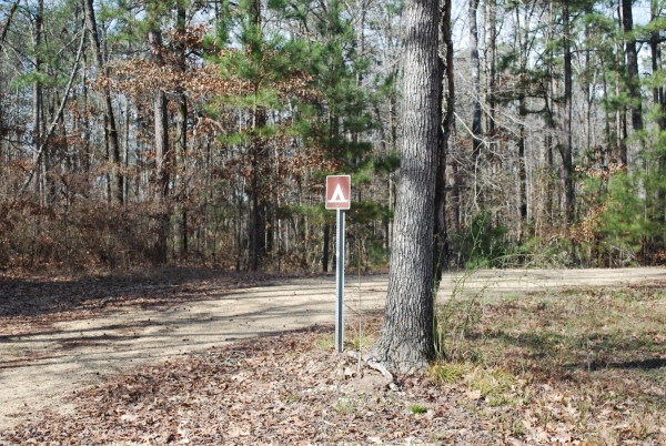 Signs indicating campsites within the refuge