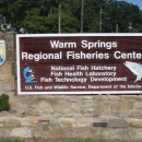 The Fish Technology Center brown and white entrance sign welcomes visitors to the facility.