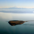 Aerial view of Protection Island NWR with Mt. Baker in the distance