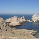 Steep rocky islands surrounded by the ocean
