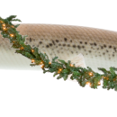 Alligator gar fish is decorated with garland and red hat