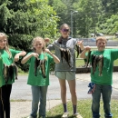 Showing off their catch for the day.