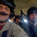 Aerial survey crew Zach Lyall (front right), Jeff Drahota (front left), and Trey McClinton in a plane