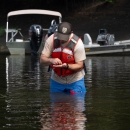 Biologist sorting mussels