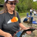 Lady holding fish