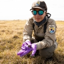 woman on the tundra in FWS gear