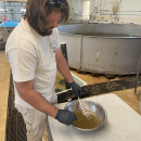 Cole Cochran stirring Alligator Gar eggs. 
