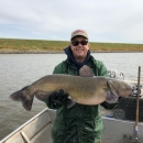 Porath holding large catfish caught at yankee hill reservoir