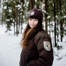 woman in FWS gear in the snow