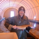 Biologist holds a large fish