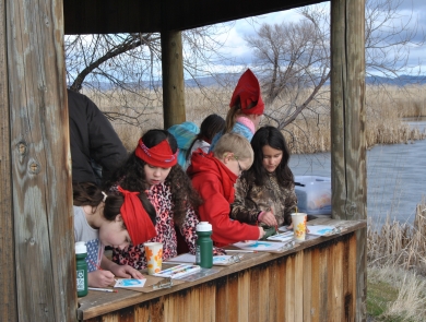 Children painting in a viewing blind at Discovery Marsh at Tule Lake NWR