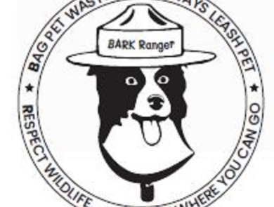 Cartoon dog with hat that says "BARK Ranger" and the words "Bag pet waste. Always leash pet. Respect wildlife. Know where you can go." 