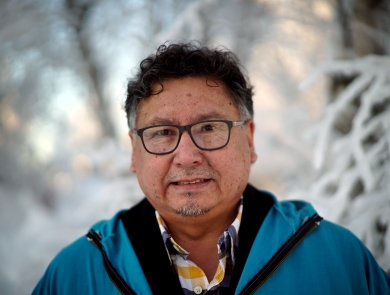 close up of a man in blue