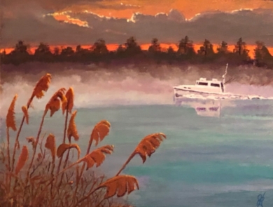 Image of boat on the water with grasses and trees