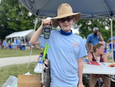 Young angler takes part in Catch a Rainbow Derby at Wolf Creek National Fish Hatchery