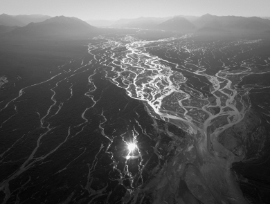 A black and white, aerial photo of a braided river on the Coastal Plain