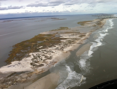 barrier island covered with water and sand 