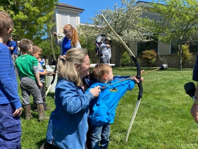Child shooting soft tip archery