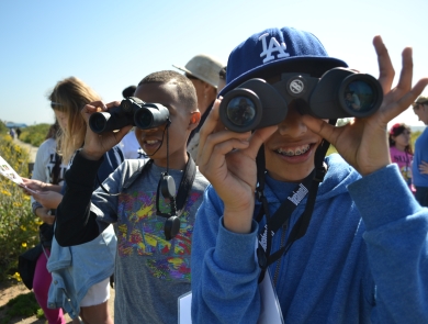 Young children birding at San Diego Bay National Wildlife Refuge