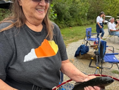 Lady holding fish