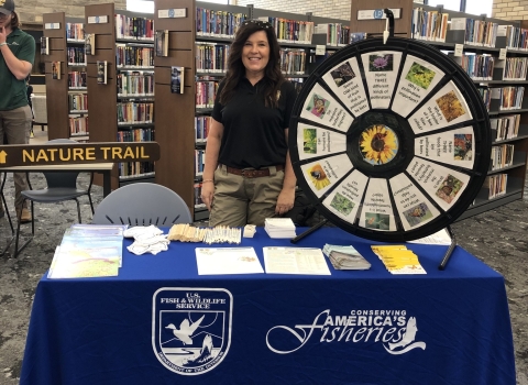 Wolf Creek National Fish Hatchery table at Read Across Russell County event